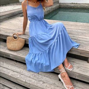 Contemporary crisscross back swing cami dress